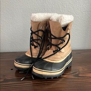 Sorel Tan and Black Winter Boots